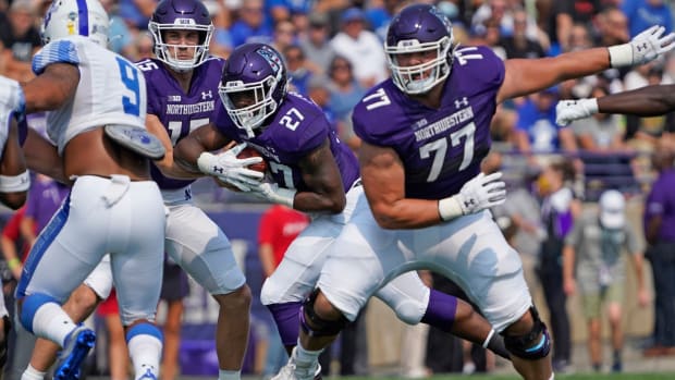 Northwestern Wildcats running back Anthony Tyus III (27) runs against the Indiana State Sycamores during the first half at Ryan Field. David Banks-USA TODAY Sports